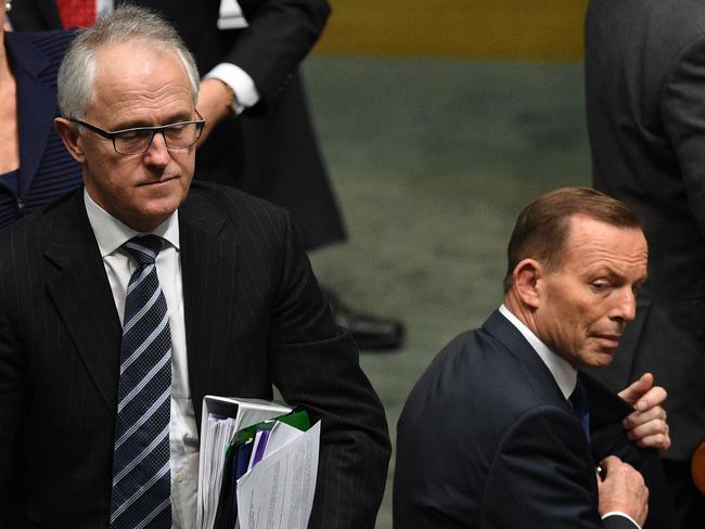 Mr Turnbull when he was federal communications minister and Mr Abbott looking on as prime minister in August 2015. Picture: AAP