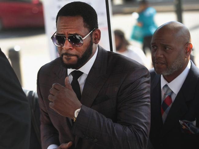 R &amp; B singer R. Kelly (C) arrives at the Leighton Criminal Courts Building for a hearing in Chicago, Illinois in 2019. Picture: Getty Images North America/AFP