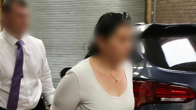 Members of the NSW Joint Counter Terrorism Team have arrested a 40 -year-old woman for allegedly financing terrorism. Picture: NSW Police