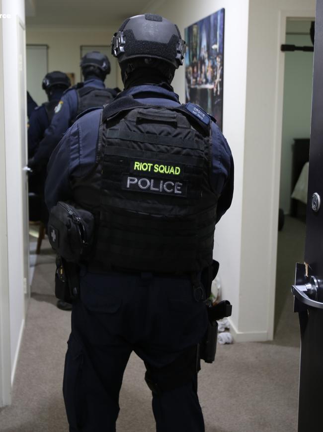 Riot police carry out an early-morning raid in Liverpool this morning. Picture: NSW Police