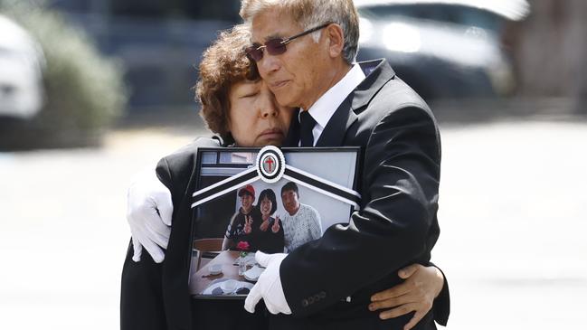 The parents of murdered man Steven Cho, Gum Ja Moon and Jong Yoon Cho as they farewell the coffins of their son, daughter-in-law Min, and grandson Benjamin Cho. The family was allegedly murdered by Kwang Kyung Yoo on February 19. Picture: Richard Dobson