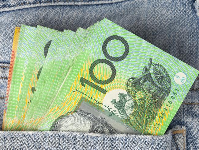 Australian 100 dollar notes in jeans pocket. money, wealthy, rich generic