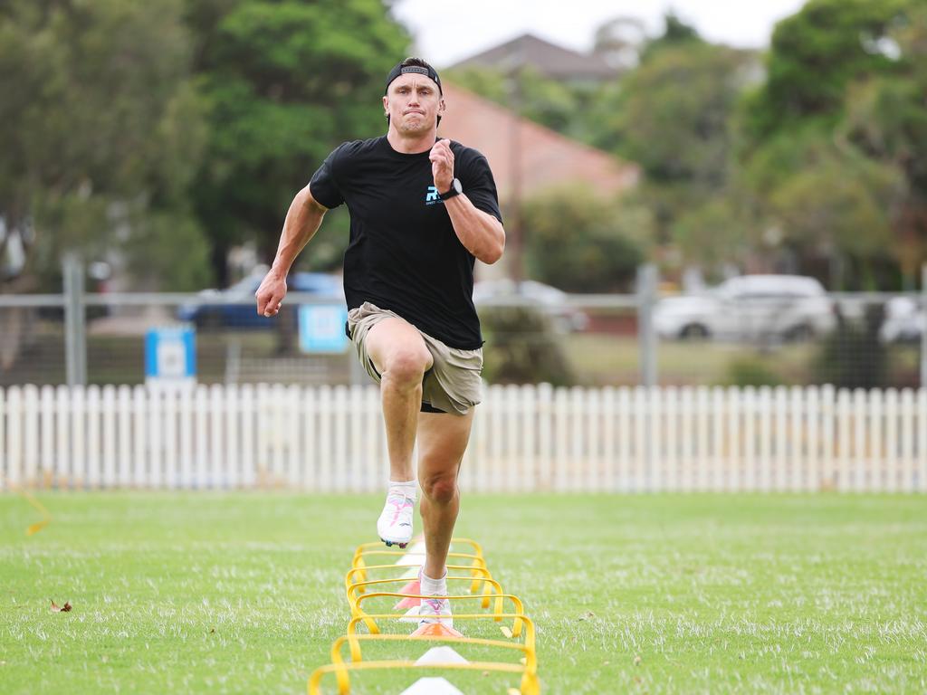 Jack Wighton training with sprint coach Roger Fabri. Picture: Rohan Kelly