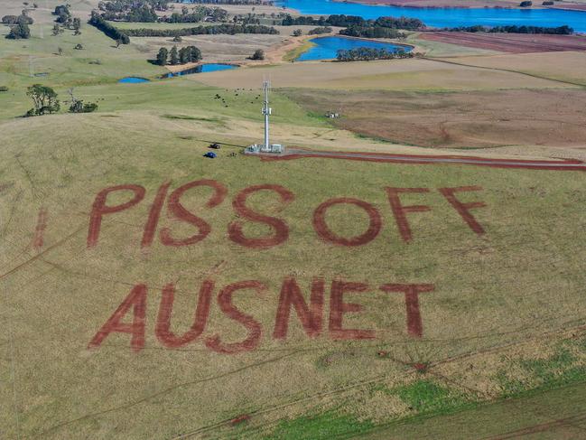 CONTACT HERALD SUN PIC DESK BEFORE USE-----Farmer Joee Aganetti-Fraser, 17,  is upset over plans for huge electricity  towers to go through her property under the 190km Western Victorian Transmission Network project. Her farm is next to the proposed terminal station and she's ploughed a protest sign on a hill.Picture: Alex Coppel.