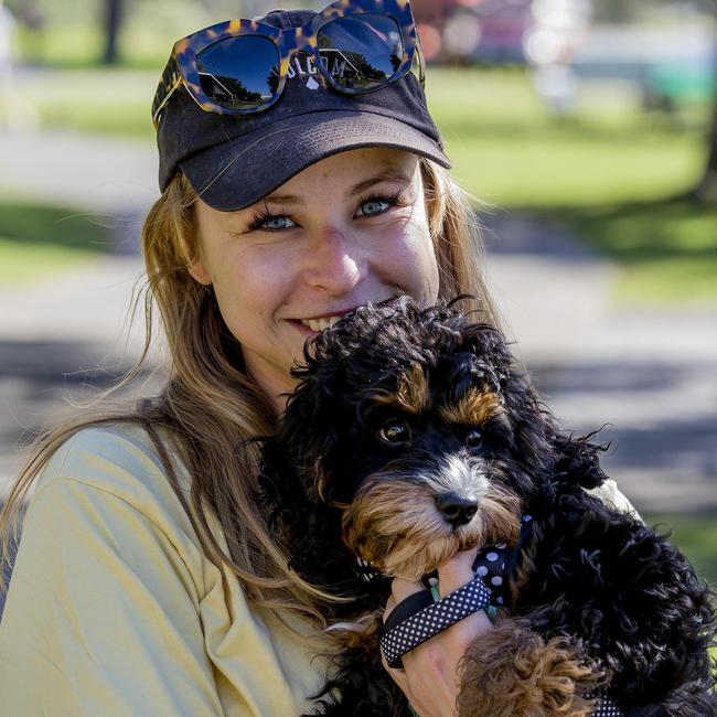 Faces of the Gold Coast at Paradise Point. Paige Jenkinson with her dog Elvis. Picture: Jerad Williams