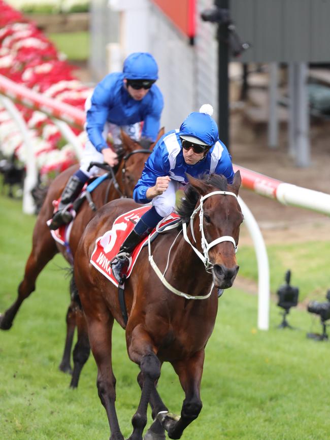 Winx and Hugh Bowman after winning a fourth Cox Plate. 