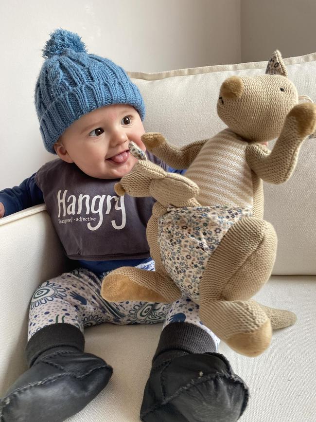 Kyrie O’Toole. Nine months old. I’m such a happy boy, I clap and shake my head ‘no’ at everything. I love chasing my big sister around in my walker and bouncing in the jolly jumper.