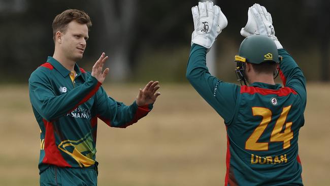 MELBOURNE, AUSTRALIA - SEPTEMBER 25: Matthew Kuhnemann of Tasmania celebrates the wicket of Jack Wildermuth of Queensland during the ODC match between Tasmania and Queensland at CitiPower Centre, on September 25, 2024, in Melbourne, Australia. (Photo by Darrian Traynor/Getty Images)