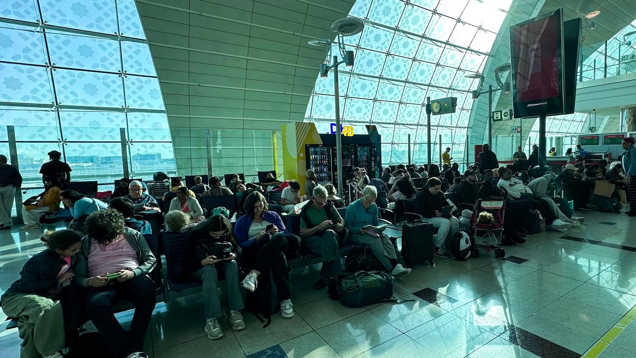 Passengers wait for their flights. Picture: AFP