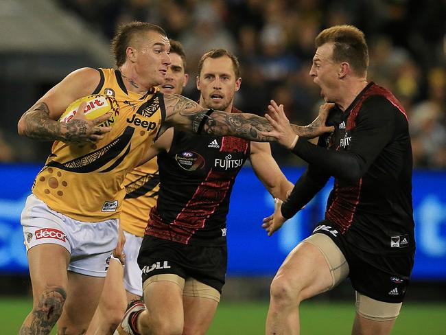 AFL: Round 10 Essendon v Richmond Dustin Martin fends off Brendon Goddard  Picture:Wayne Ludbey