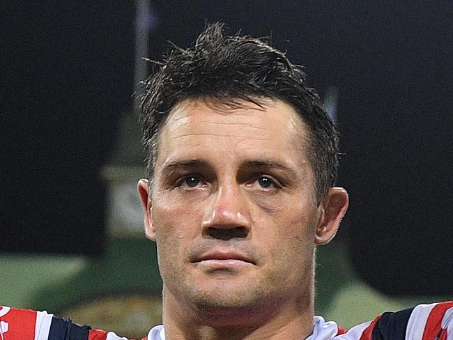 Cooper Cronk of the Roosters gestures to supporters following their win over the Storm in the NRL Preliminary Final match between the Sydney Roosters and Melbourne Storm at the SCG in Sydney, Saturday, September 28, 2019. (AAP Image/Dan Himbrechts) NO ARCHIVING, EDITORIAL USE ONLY