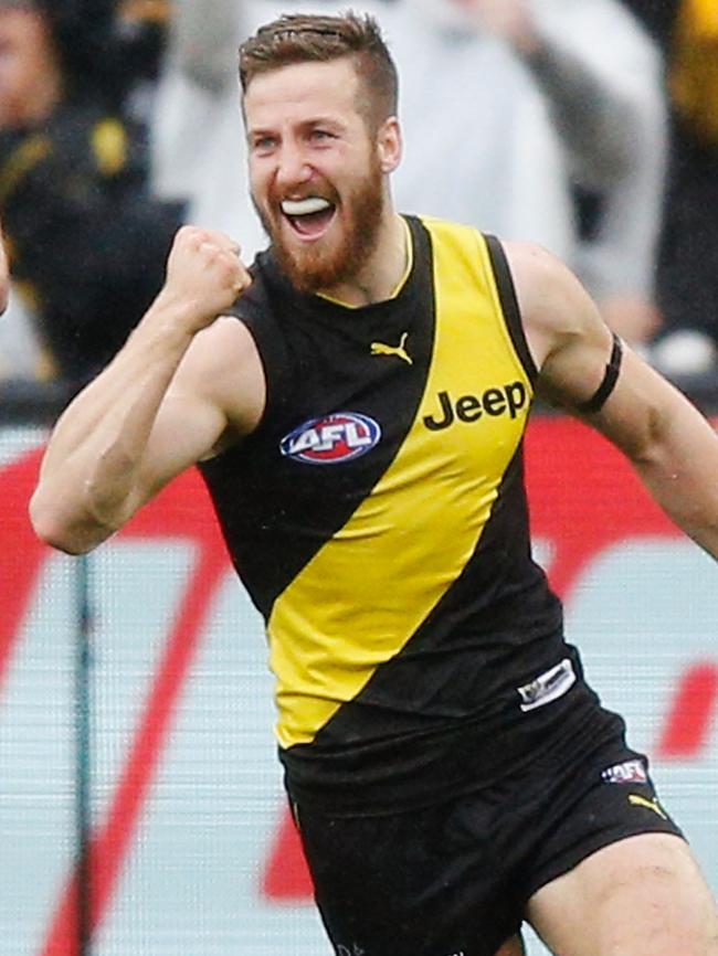 Kane Lambert celebrates a goal against GWS.