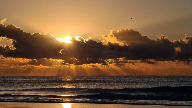 Sunrise at Pottsville Beach on Anzac Day, 2020. Picture: Angela Curry