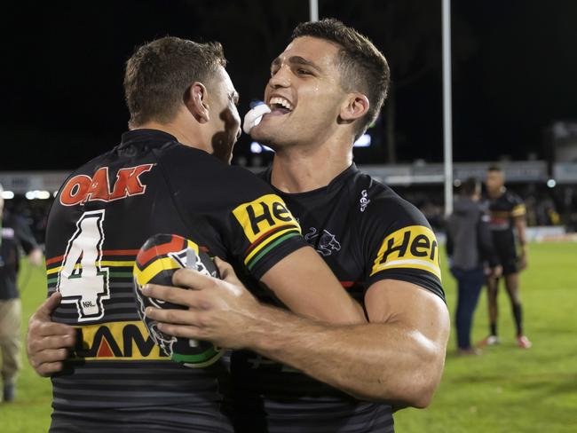 Nathan Cleary of the Panthers (right) and Brent Naden celebrate at full time of the Round One NRL match between Penrith Panthers and Sydney Roosters at Panthers Stadium in Sydney, Saturday, March 14, 2020. (AAP Image/Craig Golding) NO ARCHIVING, EDITORIAL USE ONLY