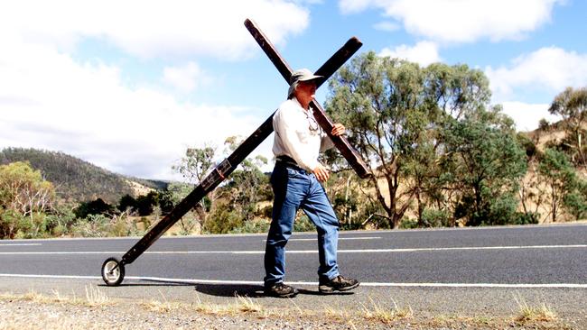 Roving pilgrim Arthur Blessitt makes his way Down Under along the Midland Highway.