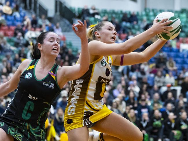 Hawk Ellie Marshall jostles for possession. Picture: Minch Media