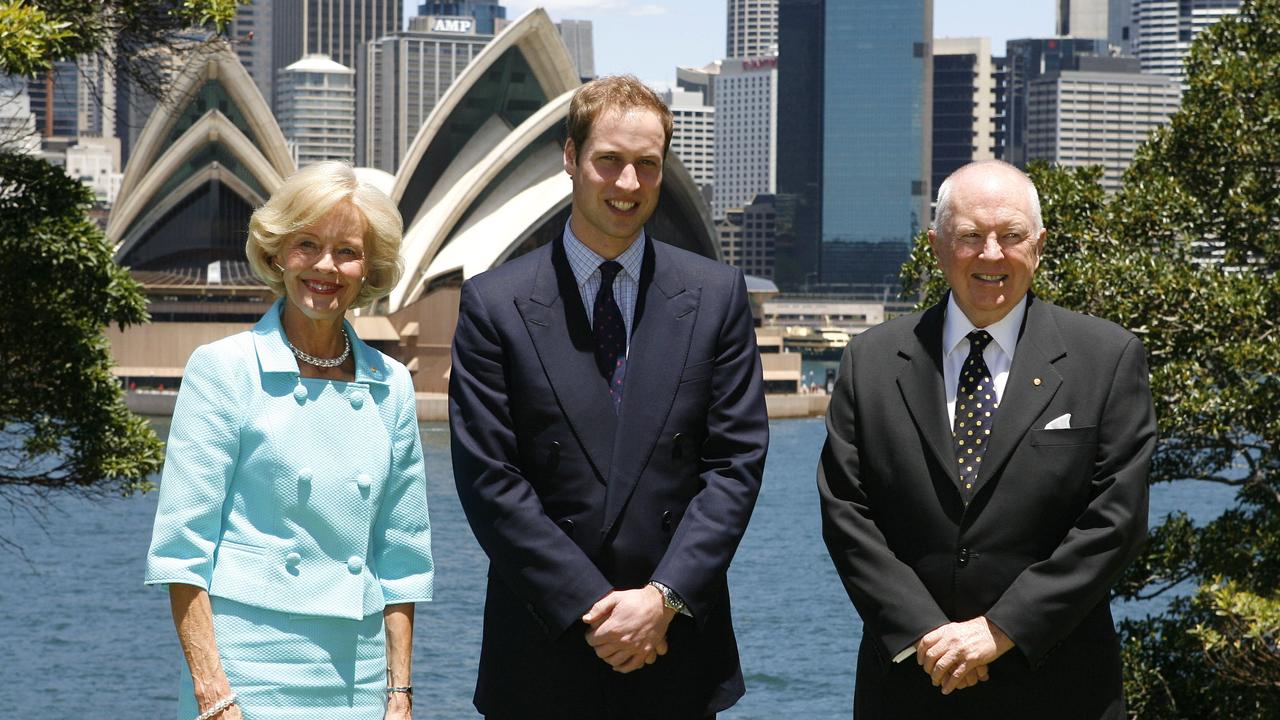 Prince William is greeted by Australia's Governor General Quentin Bryce and her husband Michael Bryce as he arrives for lunch at Admiralty House in Sydney in 2010. Picture: AFP