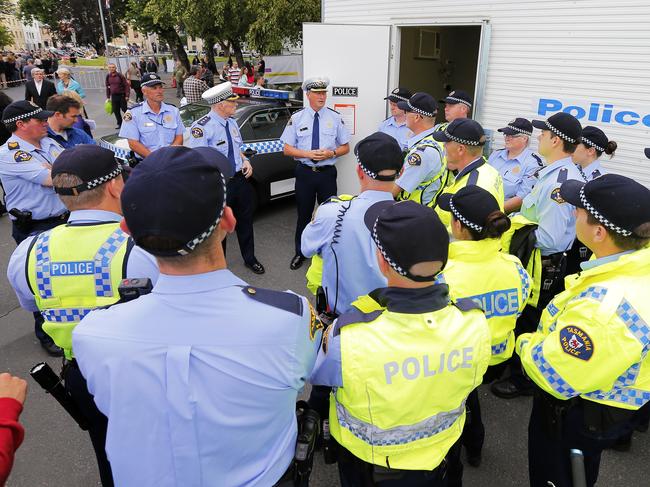 Police attend a New Year’s Eve briefing.