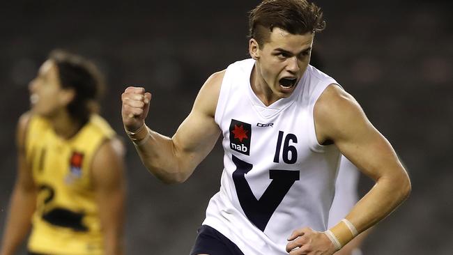 Brodie Kemp celebrates a goal for Vic Country against Western Australia.