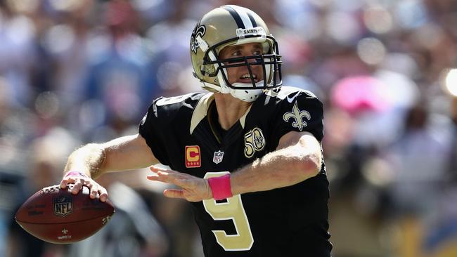 Saints QB Drew Brees, #9, airs it out in San Diego.