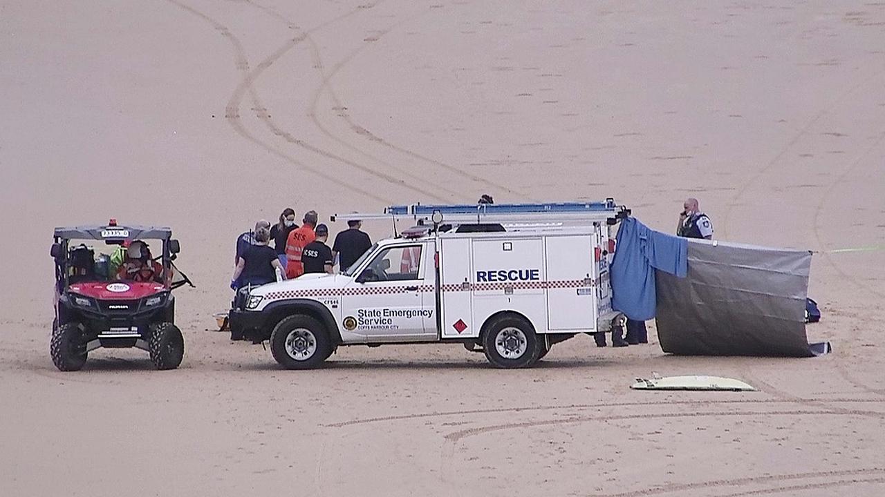 Emergency crews on the beach. Picture: Frank Redward