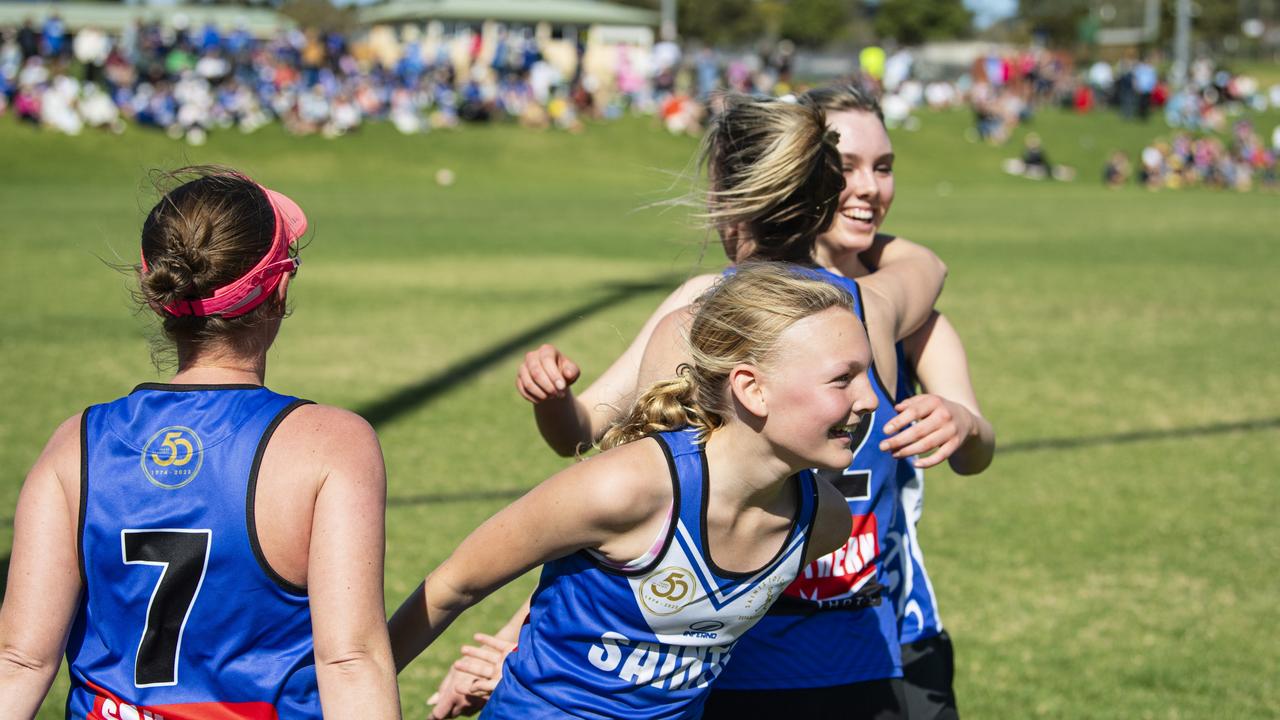 Saints celebrate their win in extra time against Highfields in the C-grade women’s grand final.