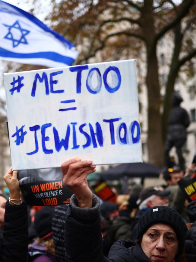 A demonstrator holds a placard during a rally in London.