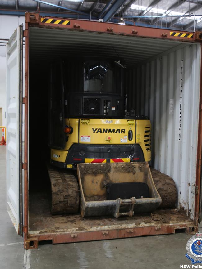 ABF officers intercepted a shipping container found to contain three excavators allegedly stolen. Pictures: NSW Police