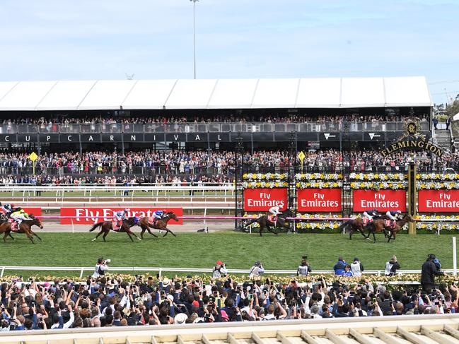 Cory Brown rides Rekindling to victory in the 2018 Melbourne Cup.