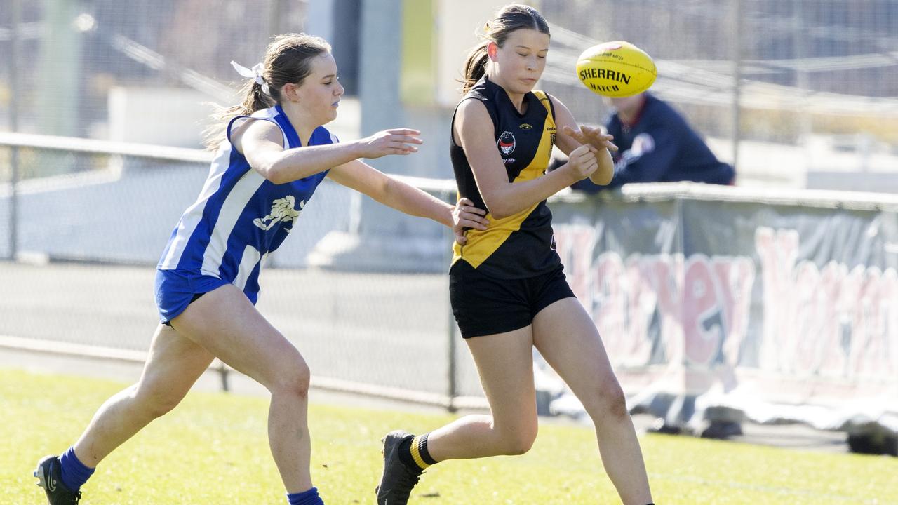 STJFL U14 A2, Kingborough Molly Wilcox and Sandy Bay Lucie Bignell at North Hobart. Picture: Chris Kidd