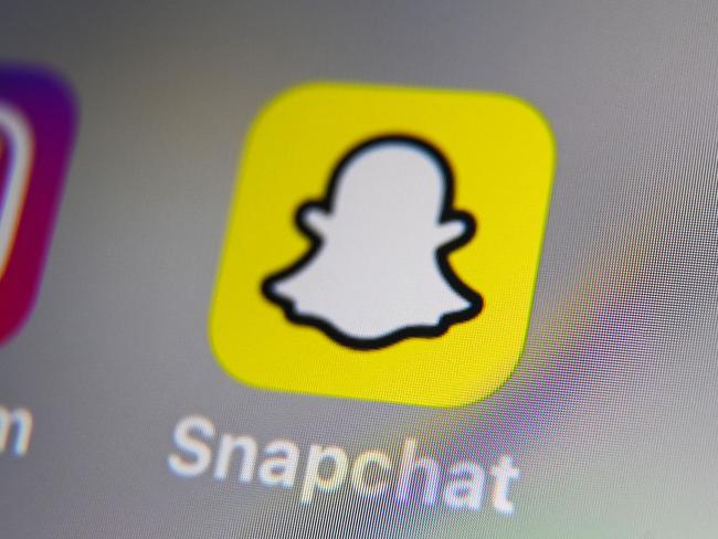 (FILES) This file photo taken on October 01, 2019, shows the logo of mobile app Snapchat displayed on a tablet in Lille. - US tech firm Snap on June 29, 2022, launched a subscription version of Snapchat as it looks to generate more money from the image-centric, ephemeral messaging app. (Photo by DENIS CHARLET / AFP)