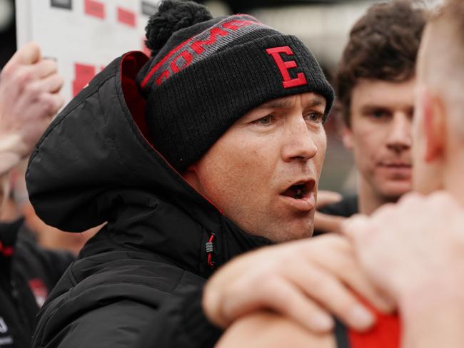 Essendon head coach Dan Jordan speaks to his players during the Second VFL Semi Final match between Essendon and Werribee at Adcon Stadium in Melbourne, Sunday, September 8, 2019. (AAP Image/Michael Dodge) NO ARCHIVING, EDITORIAL USE ONLY