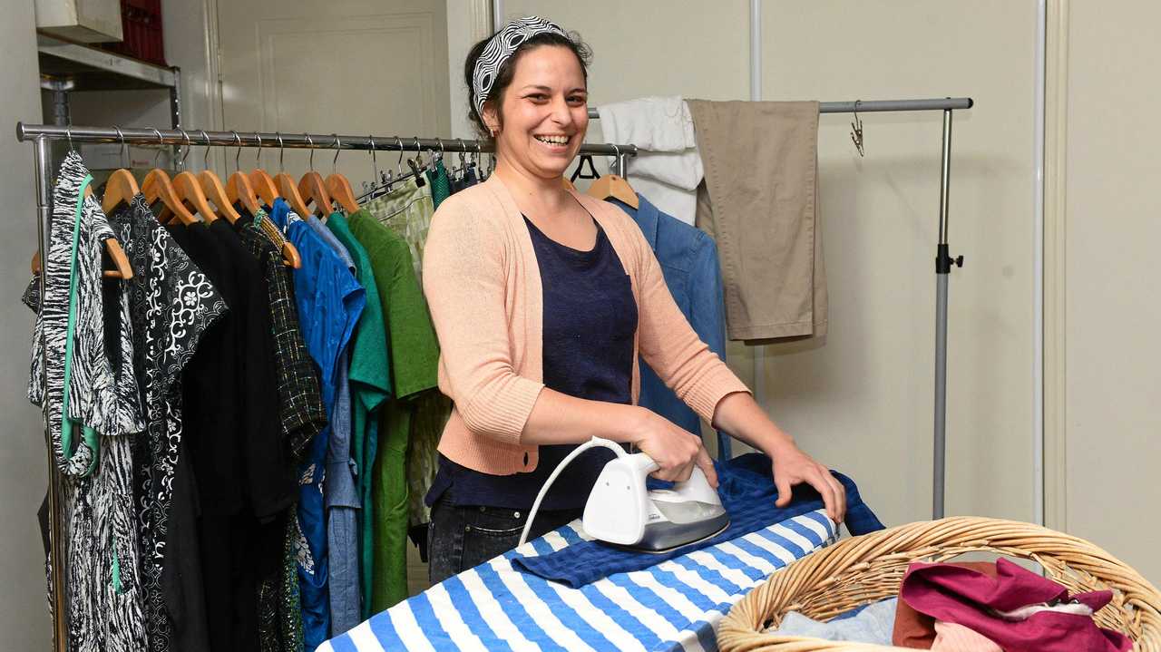 Laura Vee busy with a basket of ironing. Picture: Mike Knott BUN260719IRON1