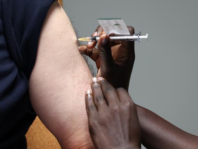 CANBERRA, AUSTRALIA-NCA NewsWire Photos FEBRUARY 23 2020: The Leader of the Australian Labor Party, Anthony Albanese received the COVID-19 vaccine  Registered nurse Yom Mapiou gave Anthony his cover jab.Picture: NCA NewsWire / Gary Ramage