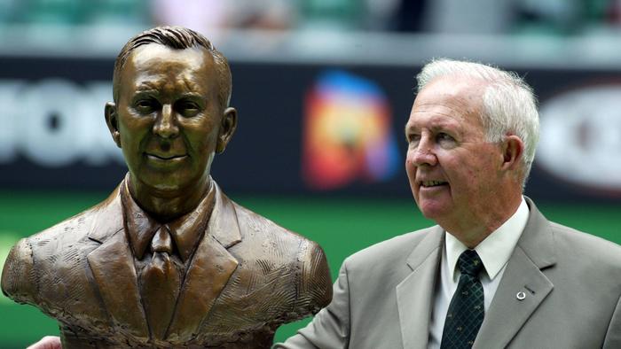 Brian Tobin stands beside his bust after being inducted into the Tennis Hall of Fame. Australian Open.  Tennis Day 8.