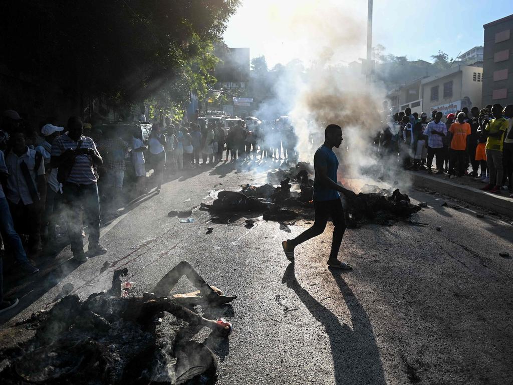 Bodies on the street in Port-au-Prince on Monday. Picture: Richard Pierrin/AFP