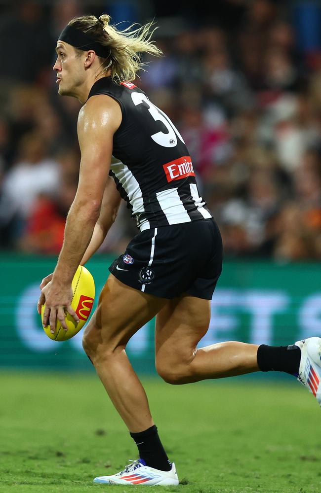 Darcy Moore in action against the Suns last week. Picture: Chris Hyde/Getty Images