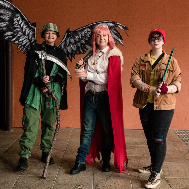 All three dressed as characters from the game Dream SMP, James Toll was dressed as Philza, Charlotte Sykes was Technoblade and Nick Black was Wilbur Soot at TROPiCON at the Darwin Entertainment Center Picture: Glenn Campbell