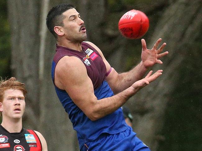 NFL footy: Banyule v Eltham: Tim Martin of Banyule marks on Saturday July 23, 2022, in Heidelberg, Australia.Picture: Hamish Blair