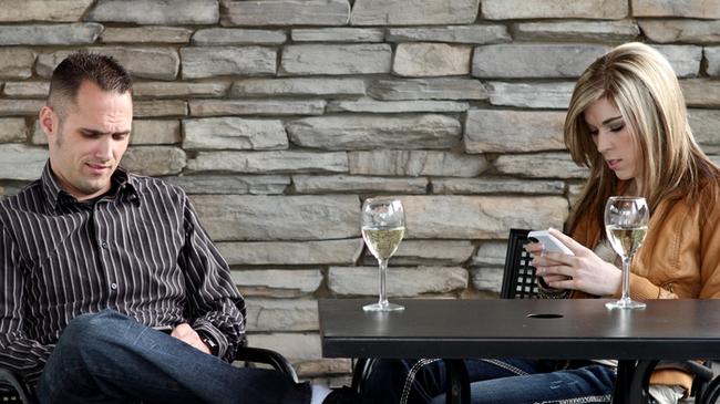 Living the dream: A happy couple dines at a restaurant. Picture: Supplied