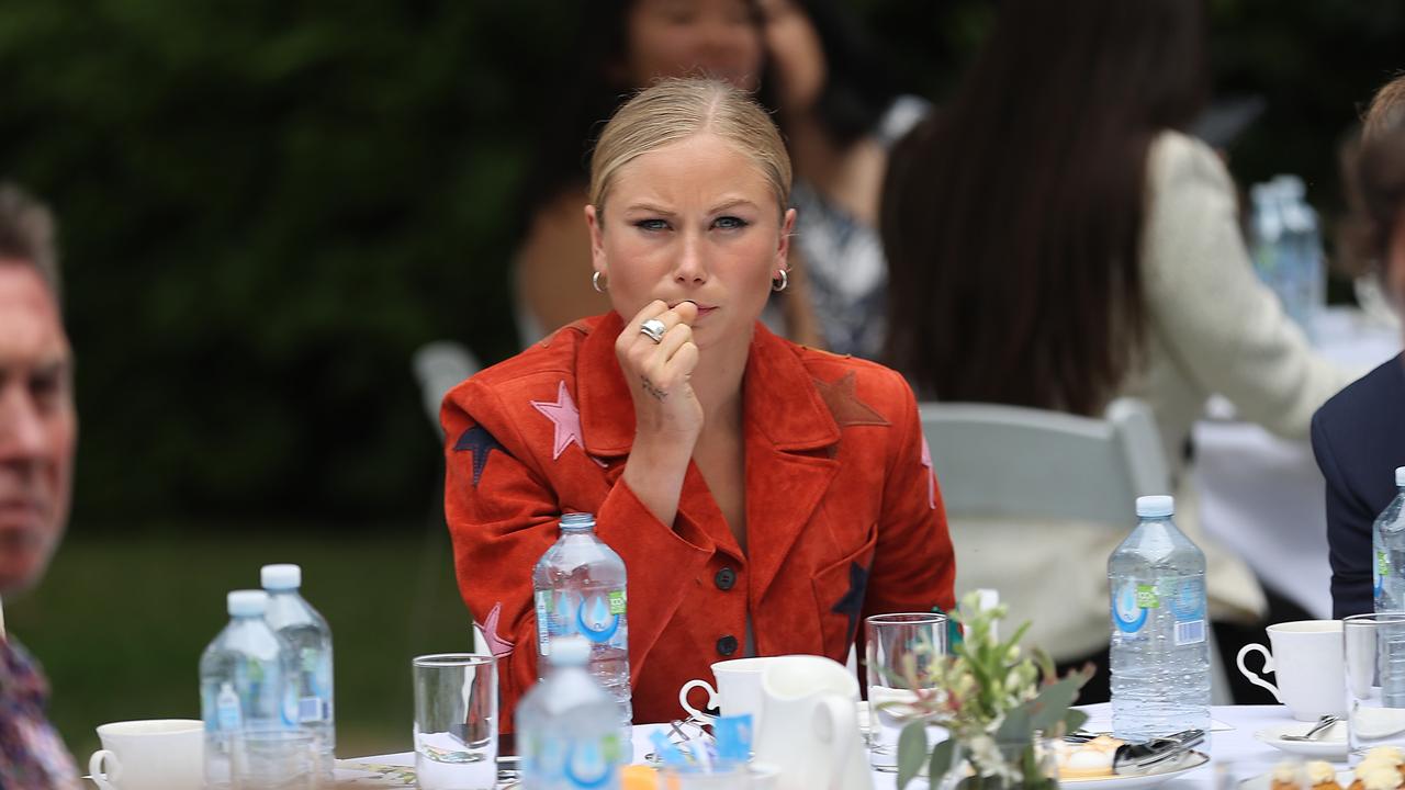 As Prime Minister Scott Morrison addressed the crowd Grace Tame did not look impressed. Picture: NCA NewsWire / Gary Ramage