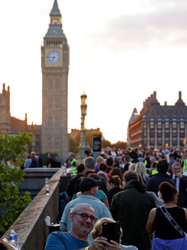 Members of the public join the queue on Westminster Bridge.