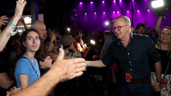 Labor leader Anthony Albanese giving high fives to music lovers at Bluesfest. Picture: Toby Zerna