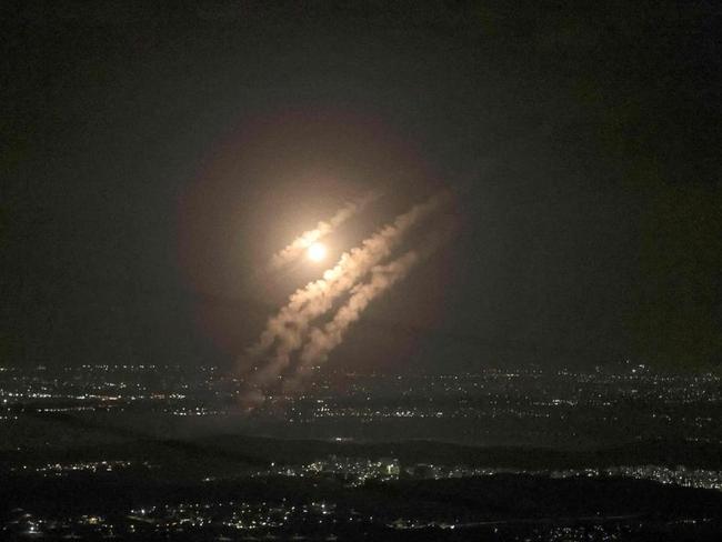 Iranians celebrate on the streets of Tehran following harrowing missile attack on Israel