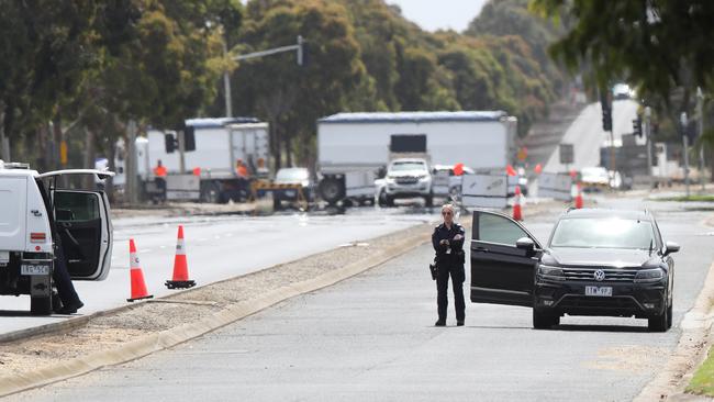 A man is fighting for life and police are investigating after a pursuit ended in a car crashing into a tree at Corio. Picture: Alan Barber