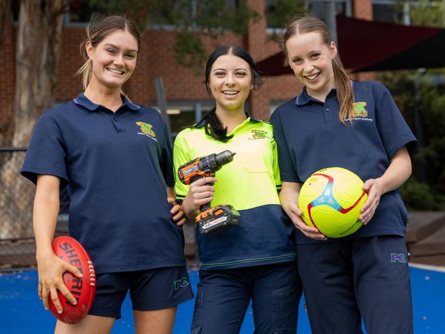 L-R Scarlett, 16,  Charlotte, 16 and Orlu, 16 Parade College in Preston as an all-boys school bur has now opened up its campus to female students as part of a new VET program. Picture: Jason Edwards