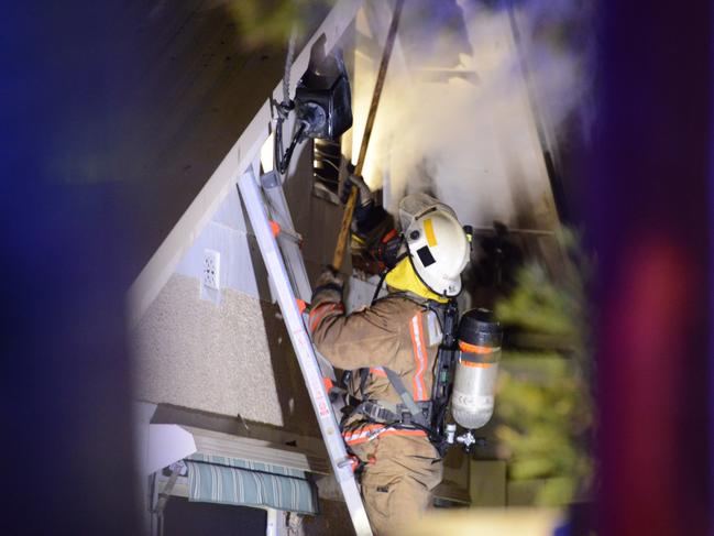 A firefighter battles a blaze at Richmond in 2017. Picture: AAP Image/Brenton Edwards