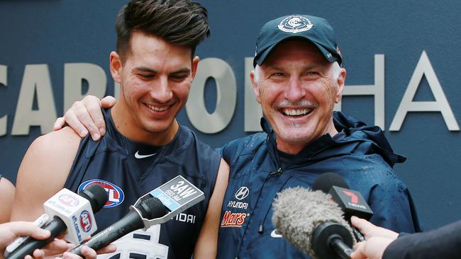 New Carlton recruit Blaine Boekhorst with coach Mick Malthouse after being drafted in 2014. Picture: Colleen Petch