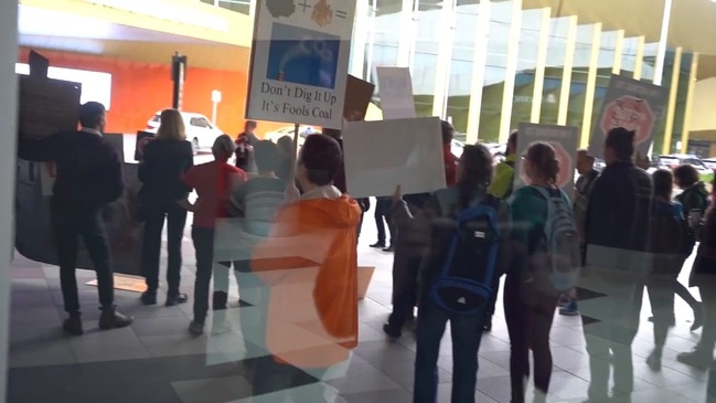 Protesters outside the Liberal Party election campaign launch in Melbourne