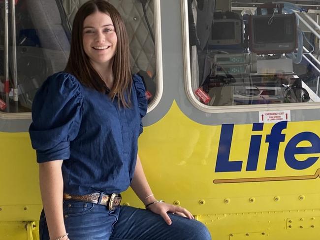 Jorja McIntyre with the RACQ LifeFlight crew who flew her to Toowoomba after she was trampled by a cow at Cinnabar in December 2023. Pictures: RACQ LifeFlight